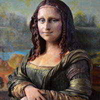 Mona Lisa Sculpted Cake in honor of DaVinci's birthday for the Sugar Art Museum. Oreo pound cake with white chocolate ganache, Modeling...